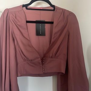 This top is from an online boutique, brand new with tags.